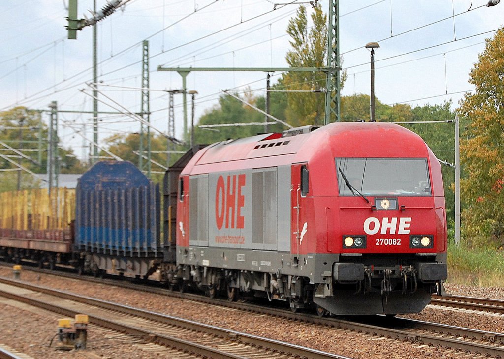 OHE 270082 (92 80 1223 103-3 D-OHE) mit Leerzug Rungenwagen f�r Holztransporte, 22.09.11 Bhf. Flughafen Berlin-Sch�nefeld.