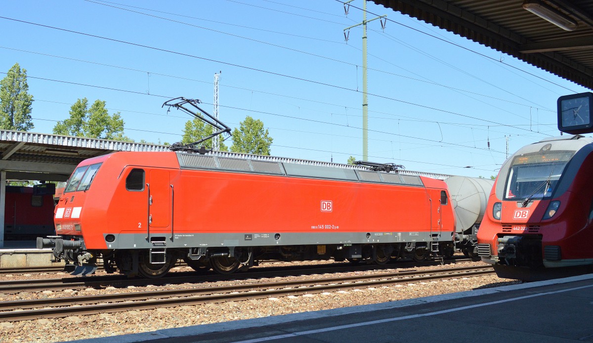 145 002-2 mit Kesselwagenzug am 05.06.15 Bhf. Flughafen Berlin-Schönefeld.