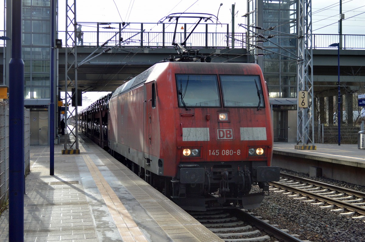 145 080-8 mit PKW-Transportzug (fabrikneue FORD-Ka) am 05.03.15 Berlin-Hohenschönhausen.
