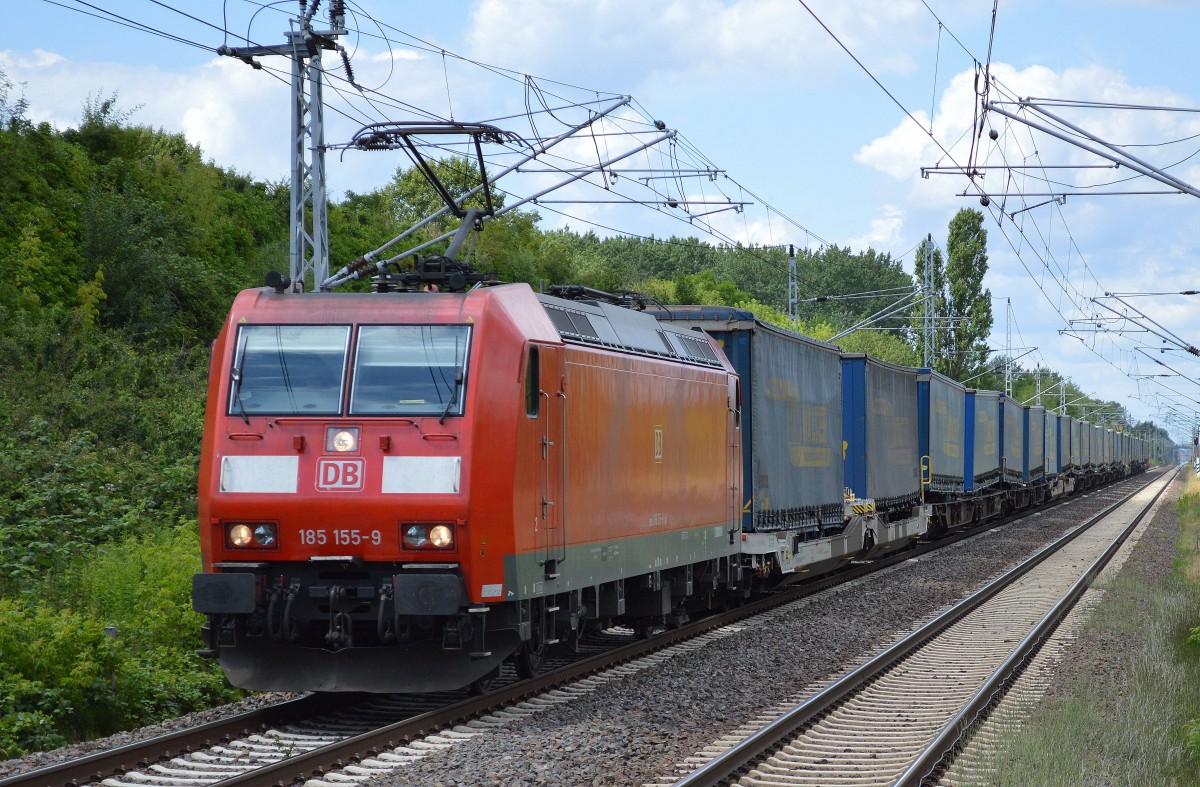 185 155-9 mit Taschenwagenzug (Sped. LKW WALTER) am 01.07.14 Durchfahrt Bhf. Berlin-Hohenschönhausen. 