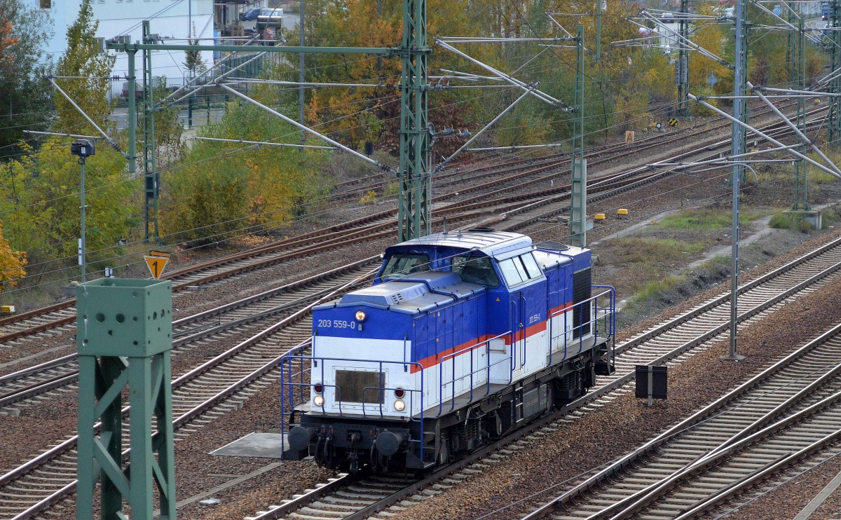 ALS Mietlok 203 559-0 für LOCON als LOCON 219 (203 164-9) am 04.11.14 Berlin-Putlitzbrücke Richtung Nordosten.