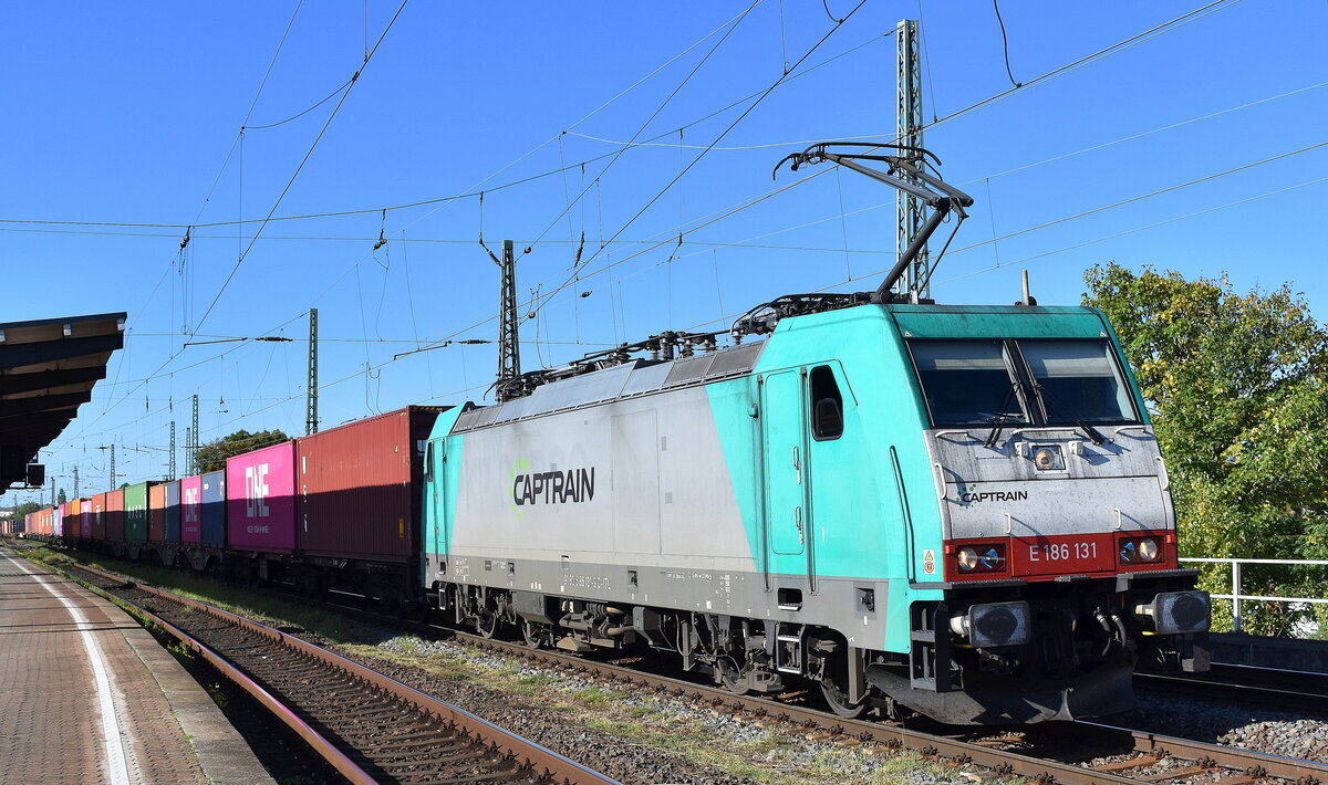 Captrain Polska Sp. z o.o., Wrocław [PL] mit ihrer  E 186 131  [NVR-Nummer: 91 80 6186 131-9 D-ITL] und einem Containerzug am 23.09.25 Höhe Bahnhof Magdeburg-Neustadt.