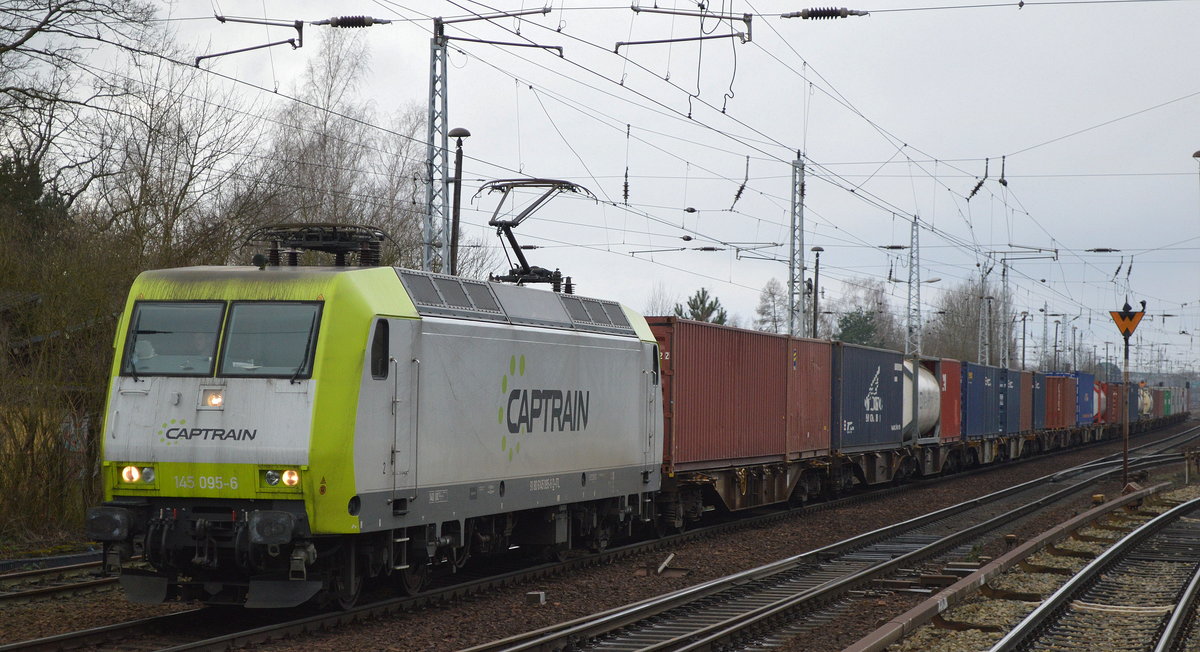 Captrain/ITL 145 095-6 mit Containerzug Richtung Frankfurt/Oder am 20.01.18 Berlin-Hirschgarten. 