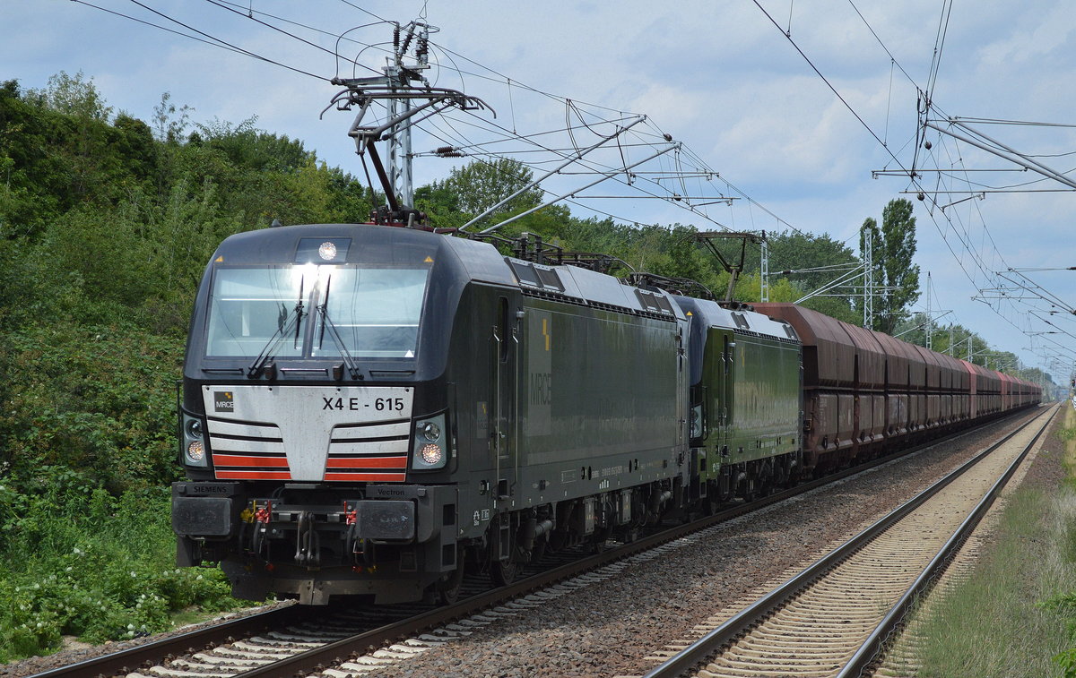 DB Cargo mit MRCE Doppeltraktion X4 E - 615 + X4 E - 616 mit Erzzug am 11.07.16 Berlin-Hohenschönhausen. 
