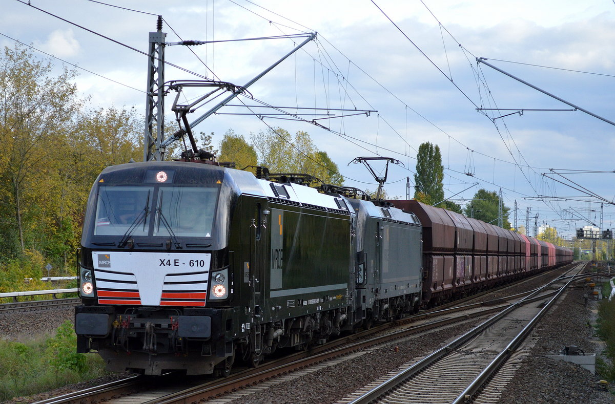 DB Cargo mit der MRCE Vectron Doppeltraktion X4 E - 610 + X4 E - 615 und einem Erzzug am 10.10.16 Berlin-Hohenschönhausen. 