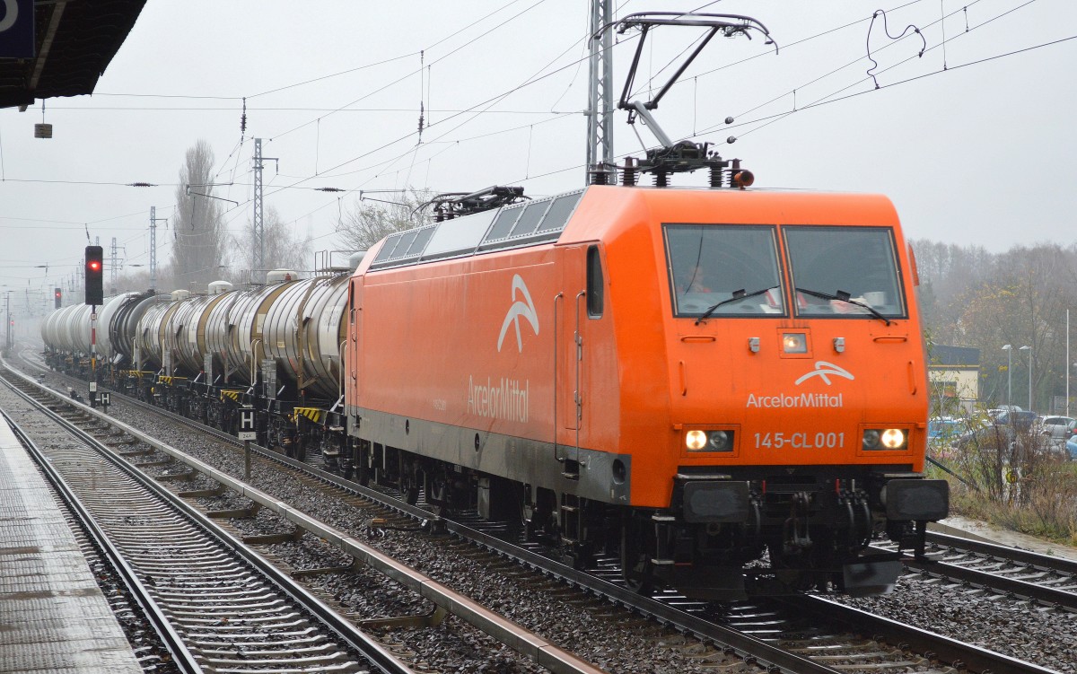 EKO-Trans/Arcelor 145-CL 001 (145 081-6) mit Kesselwagenzug am 24.11.14 Berlin-Karow. 