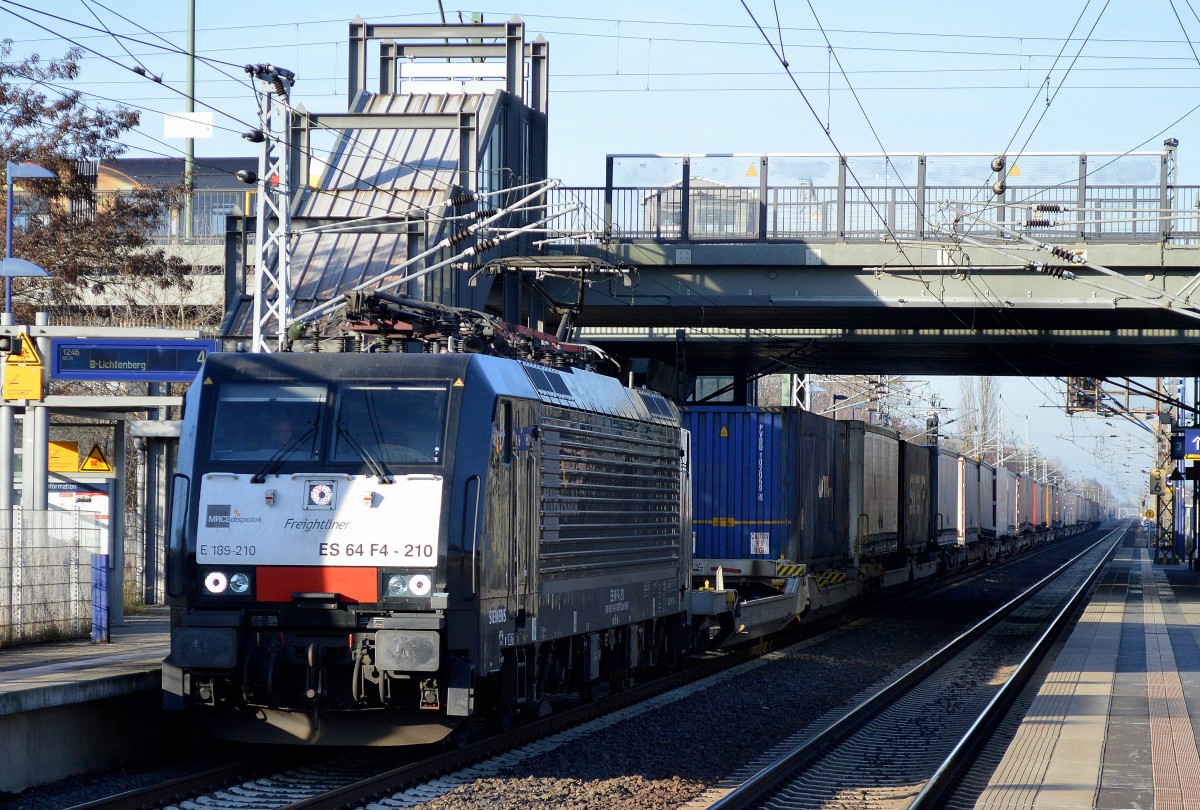 ERSR mit der MRCE Dispolok E 189-210/ES 64 F4-210 und KLV/Containerzug am 10.12.15 Berlin-Hohenschönhausen.