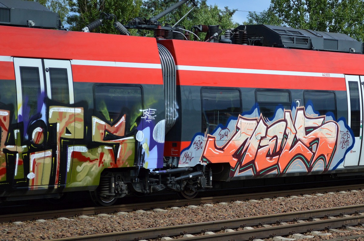 Graffiti an einem TALENT 2 am 12.08.14 Bhf. Flughafen Berlin-Schönefeld.