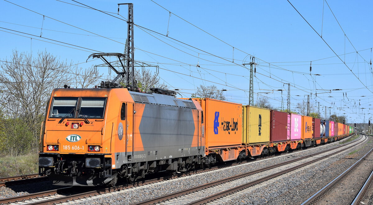 ITL Eisenbahngesellschaft mbH, Dresden [D] mit der geleasten ATLU Lok   185 606-1  [NVR-Nummer: 91 80 6185 606-1 D-ATLU] und einem Containerzug am 22.04.26 Höhe Bahnhof Saarmund.
