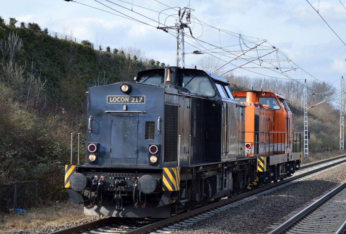 LOCON 217 (203 123-5) mit LOCON 211 (293 502-1) am Haken am 04.03.16 Berlin-Hohenschönhausen.