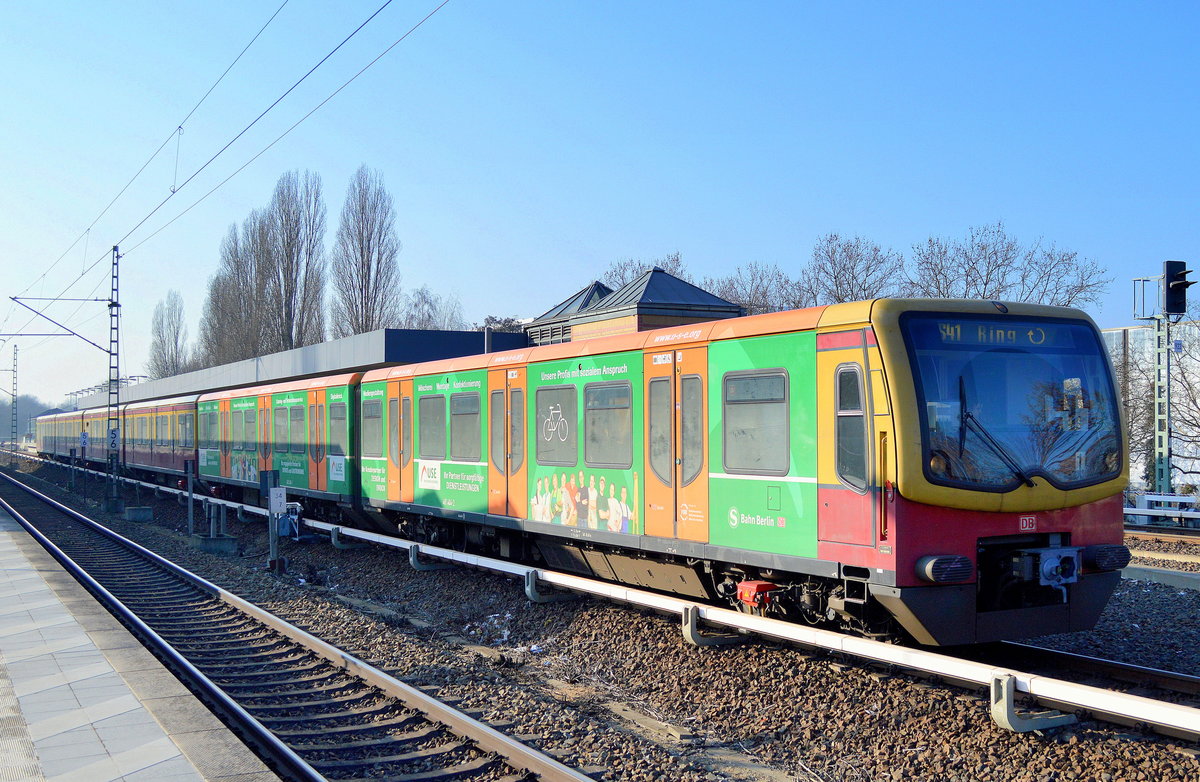 S-Bahn Viertelzug 481 404-2/482 404-1 mit USE Werbefolie als Linie S41 Ringbahn am 13.02.17 Ausfahrt Bf. Berlin-Jungfernheide.