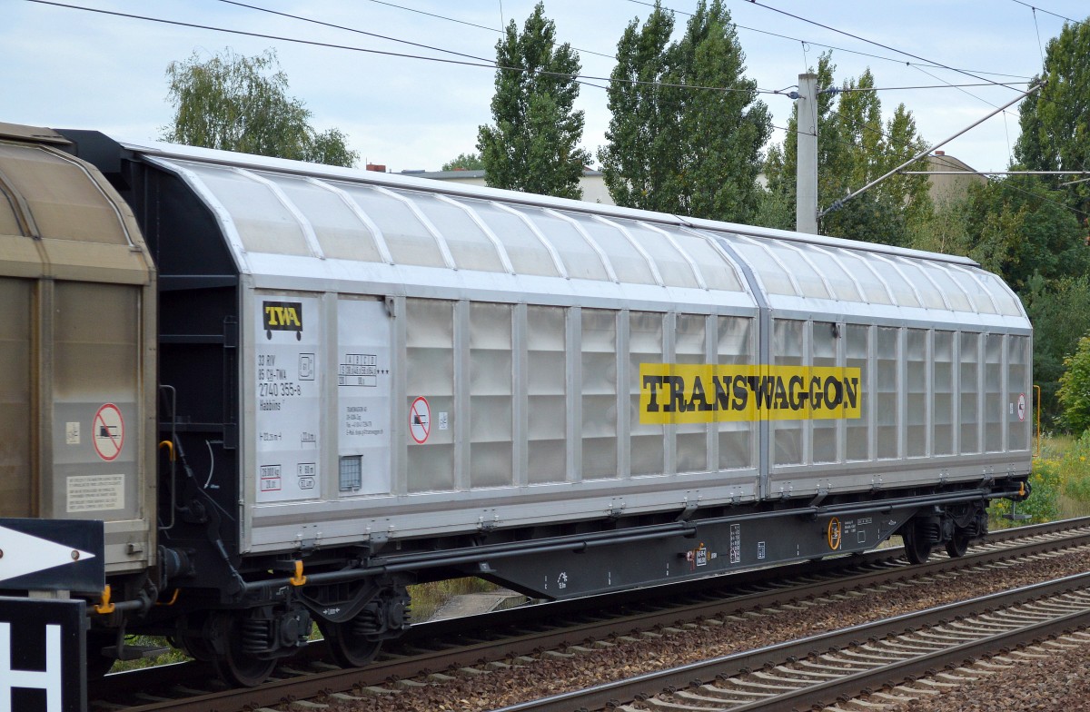 Seit l�ngerem mal wieder ein gl�nzender Schiebewandwagen noch ohne Schmutz und Flugrost, es ist ein Wagen vom Einsteller TRANSWAGGON eingestellt in der Schweiz mit der Nr. 33 RIV 85 CH-TWA 2740 355-8 Habbiins 7, 29.08.14 Berlin-Pankow.