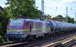 Die einzige farbige in dieser Baureihe endlich auch in Berlin-Karow, die Akiem Mietlok 37027 mit Kesselwagenzug am 27.08.14 Berlin-Karow.