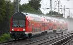 RE3 nach Schwedt, es regnet wie aus K�beln in Berlin-Karow, typisches Sommerwetter 2012 (leider), 13.07.12 Berlin-Karow. 