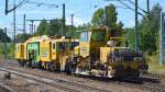 Die Lasch GmbH Zwickau mit P&T UNIMAT 09-475/4S und dahinter die Deutsche Plasser Schnellschotterplaniermaschine SSP 110SW am 12.08.14 Bhf.