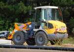 Ein STRABAG Radlader ATLAS Typ? am 05.08.10 Baustelle am Bhf.
