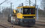DB Bahnbau Gruppe mit einem BAMOWG 54.24 (GKW 301) bei der Durchfahrt Bhf.