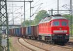 232 704-7 mit einem Ganzzug polnischer offener G�terwagen (leer) bei der Durchfahrt im Bhf.