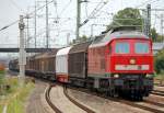 232 529-8 mit einem ganzzug Schiebewandwagen bei der Durchafahrt im Bhf.