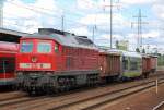 232 384-8 mit einer �berf�hrungsfahrt eines fabrikneuen RegioShuttle f�r die neue Gesellschaft agilis in Oberfranken(Bayern) am 16.08.10 bei der Durchfahrt im Bhf.