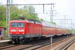 112 108 mit dem RE1 Richtung Frankfurt(Oder), 27.04.11 Berlin-Karlshorst.