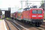 112 124-3 mit dem RE2 Richtung Rathenow, 27.04.11 Berlin-Karlshorst.