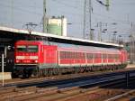 Interessante Regionalzugvariante am heutigen Tage in Sch�nefeld, der RB14 nach Senftenberg im Sandwichverfahren mit alten S-Bahn Regionalpersonenwagen und 114 038 und 112 ??? im Regeleinsatz, 26.01.12