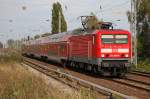 RE3 mit 114 002-9 nach Elsterwerda, 12.10.12 Berlin-Karow.
