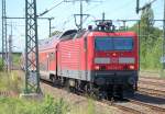 143 821-7 mit dem RE7 Richtung Dessau Hbf bei der Einfahrt im Bhf.