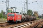 145 038-6 mit Kurzzug Kesselwagen am 07.06.12 Bhf.