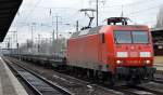 145 038-6 mit polnischen Güterwagen bei der Durchfahrt Bhf.