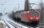 145 023-8 mit Kesselwagenzug am 03.02.15 Berlin-Karow.