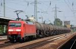 152 160-8 mit Ganzzug Kesselwagen (Xylole-Transport) bei der Durchfahrt Bhf.