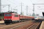 155 039-1 mit einem Ganzzug Sch�ttgutkippwagen bei der Durchfahrt im Bhf.