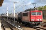 155 104-3 mit Kesswelwagenzug Richtung Berliner Innenstadt, 12.10.11 Berlin-Blankenburg.