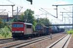 155 167-0 mit gemischtem G�terzug bei der Durchfahrt im Bhf.