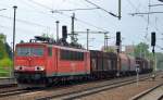 155 087-0 mit einigen Güterwagen (Coils) am 24.04.14 Durchfahrt Bhf.