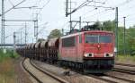 155 035-9 mit Ganzzug Schüttgutwagen (Sand) bei der Durchfahrt Bhf.