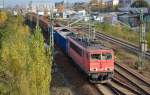 155 085-4 mit einem gemischten Güterzug mit zwei offenen Güterwagen der PKP mit Schrottquadern beladen und leeren Schüttgutwagen der VPS - Verkehrsbetriebe Peine - Salzgitter GmbH am