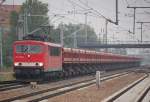 155 139-9 mit einem Ganzzug Sch�ttgutkippwagen vom Typ Fans 128, 09.09.10 Durchfahrt Bhf.