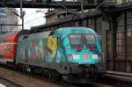 RE1 mit 182 013 als Schublok bei der Durchfahrt Bhf.