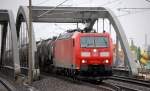 185 153-4 mit Kesselwagenzug Richtung Berliner Innenstadt am 10.12.13 Berlin-Pankow.