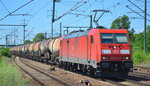 185 254-0 an diesem herrlichen heißen fast schon tropisch anmutenden Tag mit Ganzzug Knickkesselwagen (Kreideschlamm) am 23.06.16 Bf.