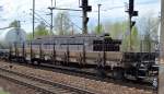 Drehgestell-Flachwagen mit Seitenborden + Rungen der DB mit der Nr.