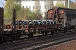 Flachwagen ohne Rungen der DB mit Rads�tzen beladen, der wagen aht die Nr.