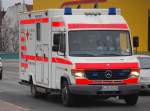 DRK Berlin mit Notfallrettungswagen MB 815 D mit breitem Kastenmodul als Aufsatz, 09.01.12 Berlin-Putlitzbr�cke.