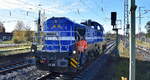 SPITZKE SE, Großbeeren [D] mit ihrer  DE18-SP-303  [NVR-Nummer: 92 80 4185 303-9 D-SLG] beim Umsetzen am 05.11.25 Höhe Bahnhof Michendorf.
