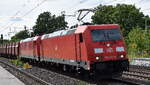 DB Cargo AG, Mainz [D] mit der Doppeltraktion  185 297-9  [NVR-Nummer: 91 80 6185 297-9 D-DB] +  185 254-0  [NVR-Nummer: 91 80 6185 254-0 D-DB] und dem Erzzug aus Hamburg Richtung Ziltendorf Eko am 08.06.26 H�he Bahnhof Saarmund.