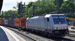 CFL Cargo Deutschland GmbH, Flensburg [D] mit der geleasten Akiem Lok  186 150-9  [NVR-Nummer: 91 80 6186 150-9 D-AKIEM] und einem Containerzug Richtung Hamburger Hafen am 14.05.25 Höhe Bahnhof