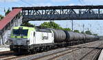 ITL - Eisenbahngesellschaft mbH, Dresden [D] mit ihrer  193 894-3  [NVR-Nummer: 91 80 6193 894-3 D-ITL] und einem Kesselwagenzug am 12.05.25 Höhe Bahnhof Saarmund.